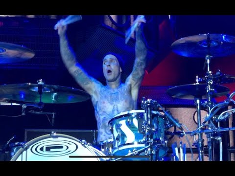 Travis Barker drumming in an upside down cage - YouTube