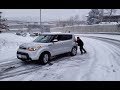 Car stuck in snow slides down icy slippery off ramp to I 405 in Seattle Washington Blizzard 2019 4K