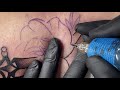 Real time tattooing  knife in flower