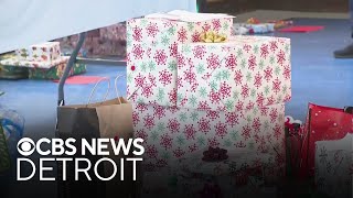 Michigan volunteers wrap gifts for foster children @CBSDetroit