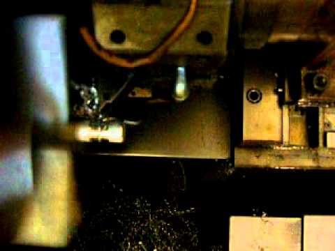 CNC lathe turning an aluminum hot rod dash knob