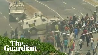 Venezuela: National Guard armored vehicles drive into protestors