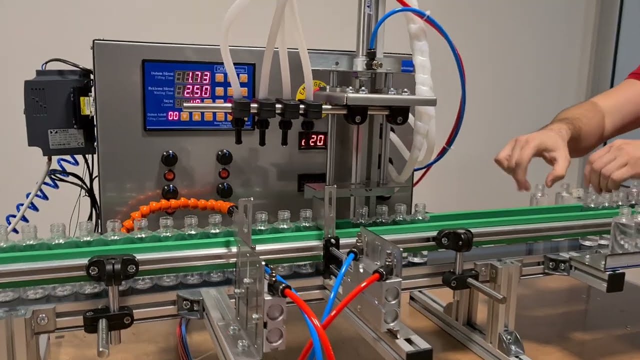 Konveyorlü 4 kafalı Sıvı dolum Makinası KNS4