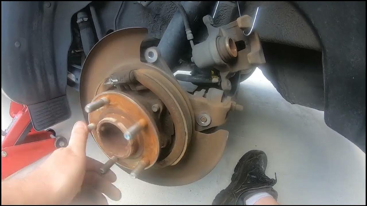 2016 kia Sedona rear pads And rotors easy driveway repair - YouTube