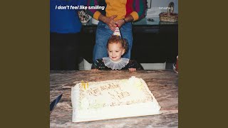 i don't feel like smiling
