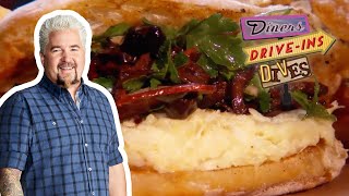 Guy Fieri Eats a Salt Cod Sandwich | Diners, Drive-Ins and Dives | Food Network