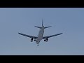 Airbus A320-200 Ямал Бованенково-Омск садится днём над центром города в Омске.