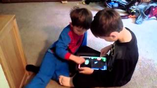 Boys playing Glow Hockey against each other. screenshot 3