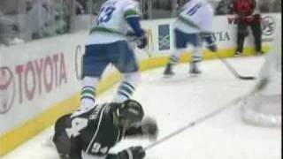 Alex Edler slams Ryan Smyth