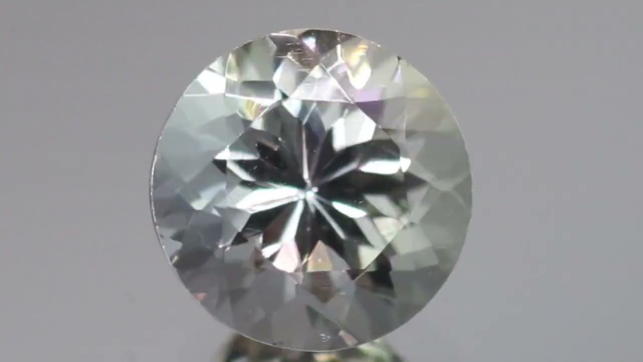 天然ゾイサイト 0.85ct 【マルチカラー】 ラウンド