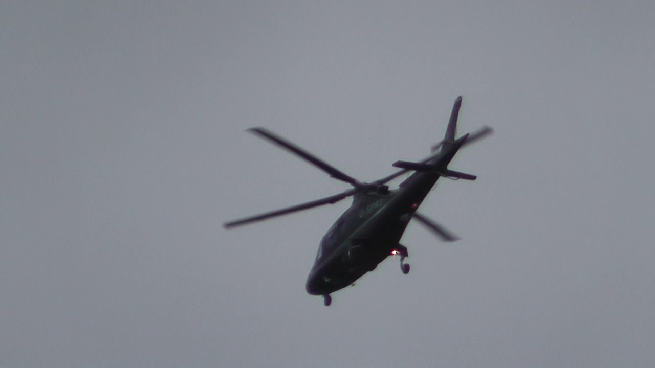 airshow schedule Share G SPRI East Midlands helicopters Augusta A109 purple helicopter flying over Cambridge UK 3ja