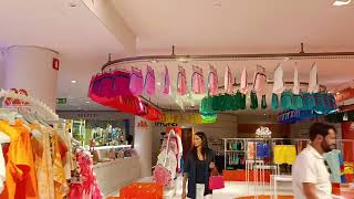 An unique motorized swim wear display at Milan Shopping centre , Italy