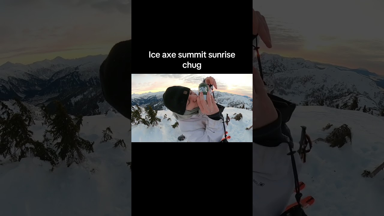 Alaskan sunrise mountain top brew chug with ice axe. 
