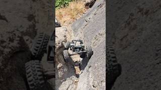 OG Axial Wraith navigating a gnarly v crack! #rc #axial #axialwraith #rccrawler #fyp #subscribe