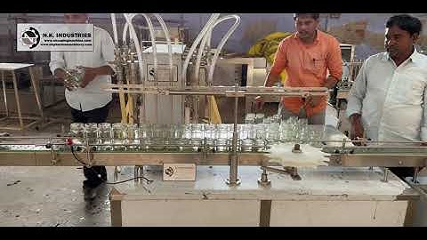 Automatic 6 head liquid filling machine | N.K. INDUSTRIES