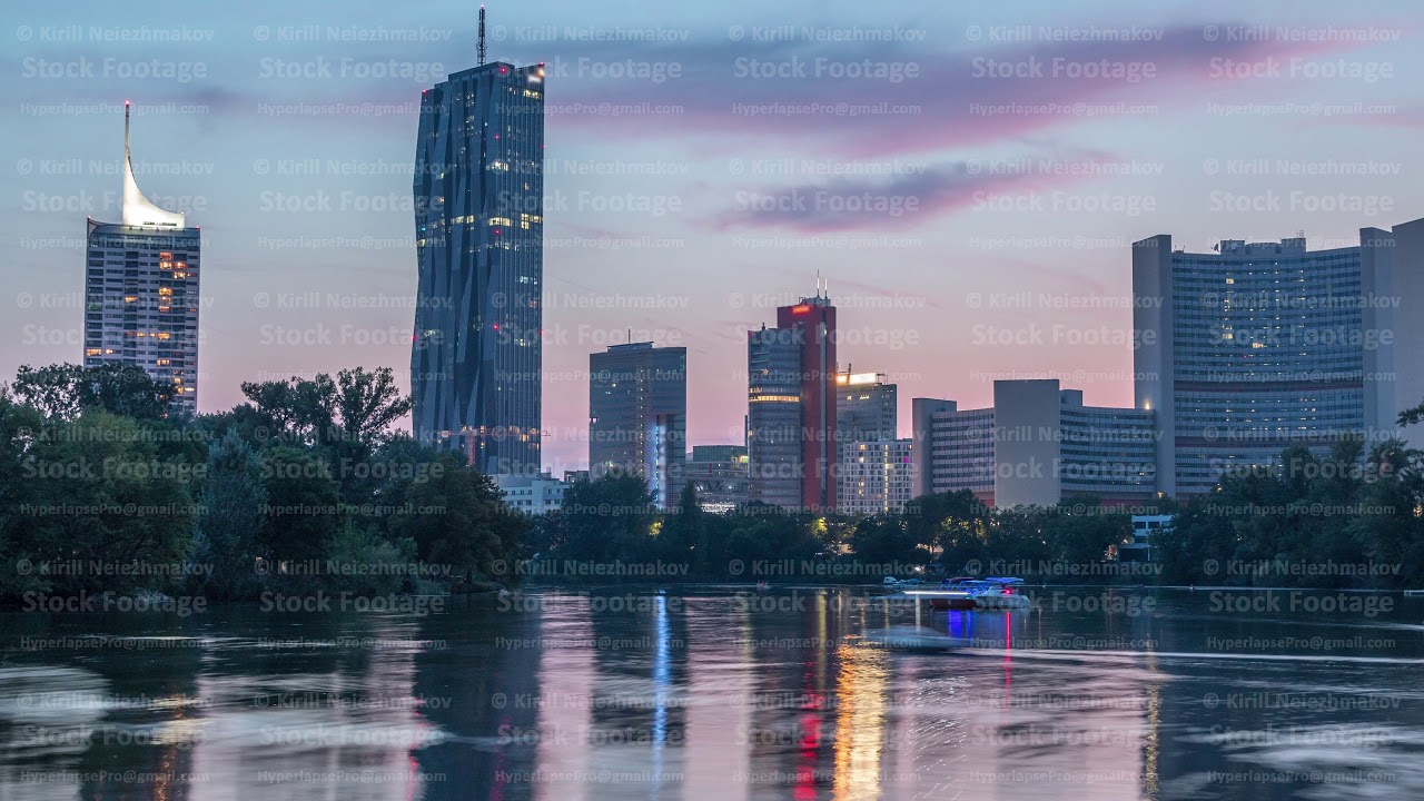 Vienna international center skyscrapers with Kaiserwasser lake reflection view day to night