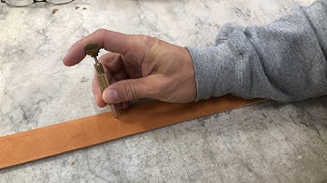 Cutting in a new belt pattern- the first step in tooling a leather belt