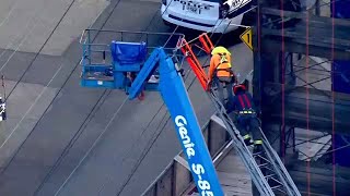 Crews trying to rescue worker trapped in power lines in Lynbrook, Long Island