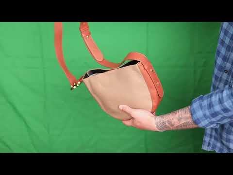 Зручна напівкругла жіноча шкіряна сумка з натуральної шкіри флотар бежева, видео 1