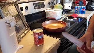 A crazy easy way to get solid stuff out of canned goods.  so canned food or canned dog food.