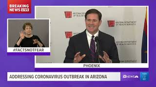Gov. Doug Ducey speaks after visiting the Department of Health Services for a briefing on COVID-19