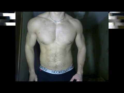 Big teen bodybuilder flexing huge chest