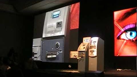 SecurityWeek.Com - ATM Spits Out Cash at Black Hat - Barnaby Jack ATM Hacking Demo