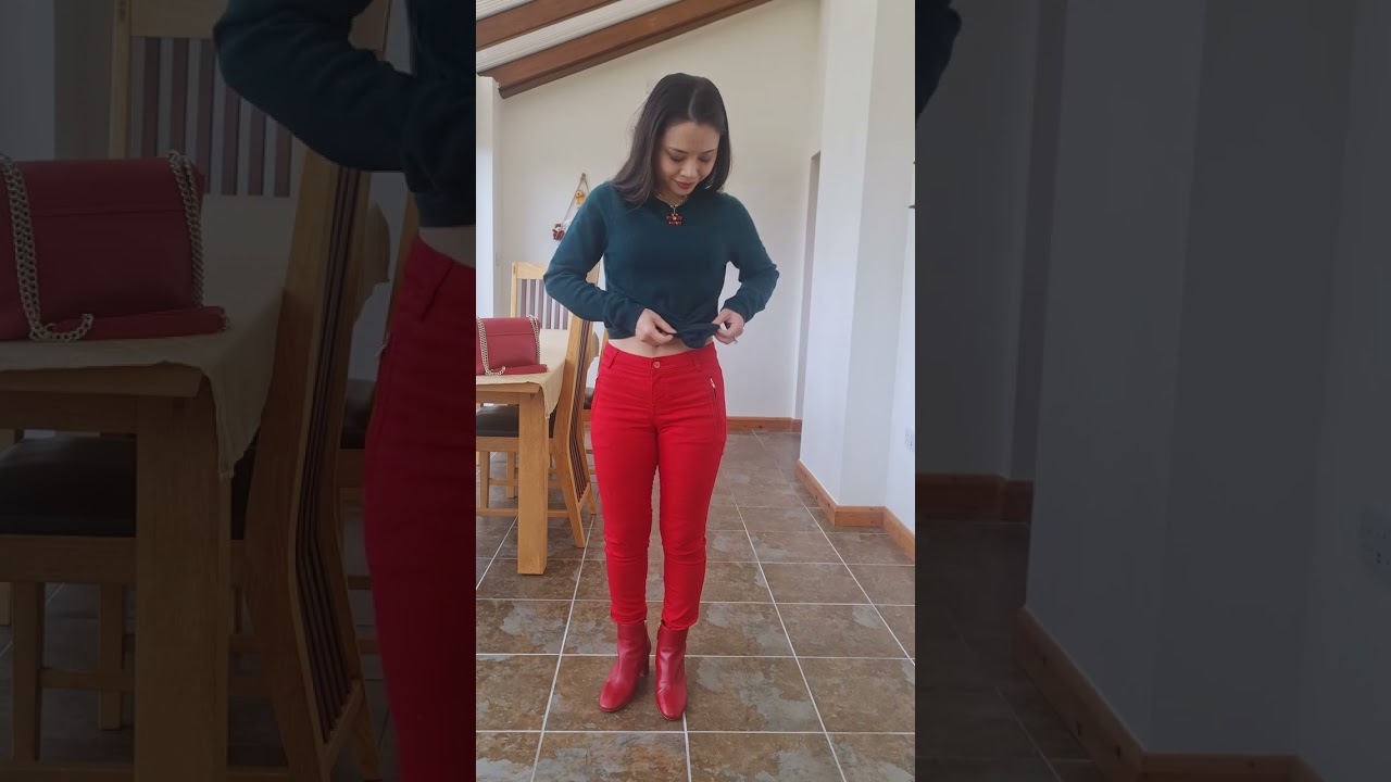 Classic Orange pants going with dark green top