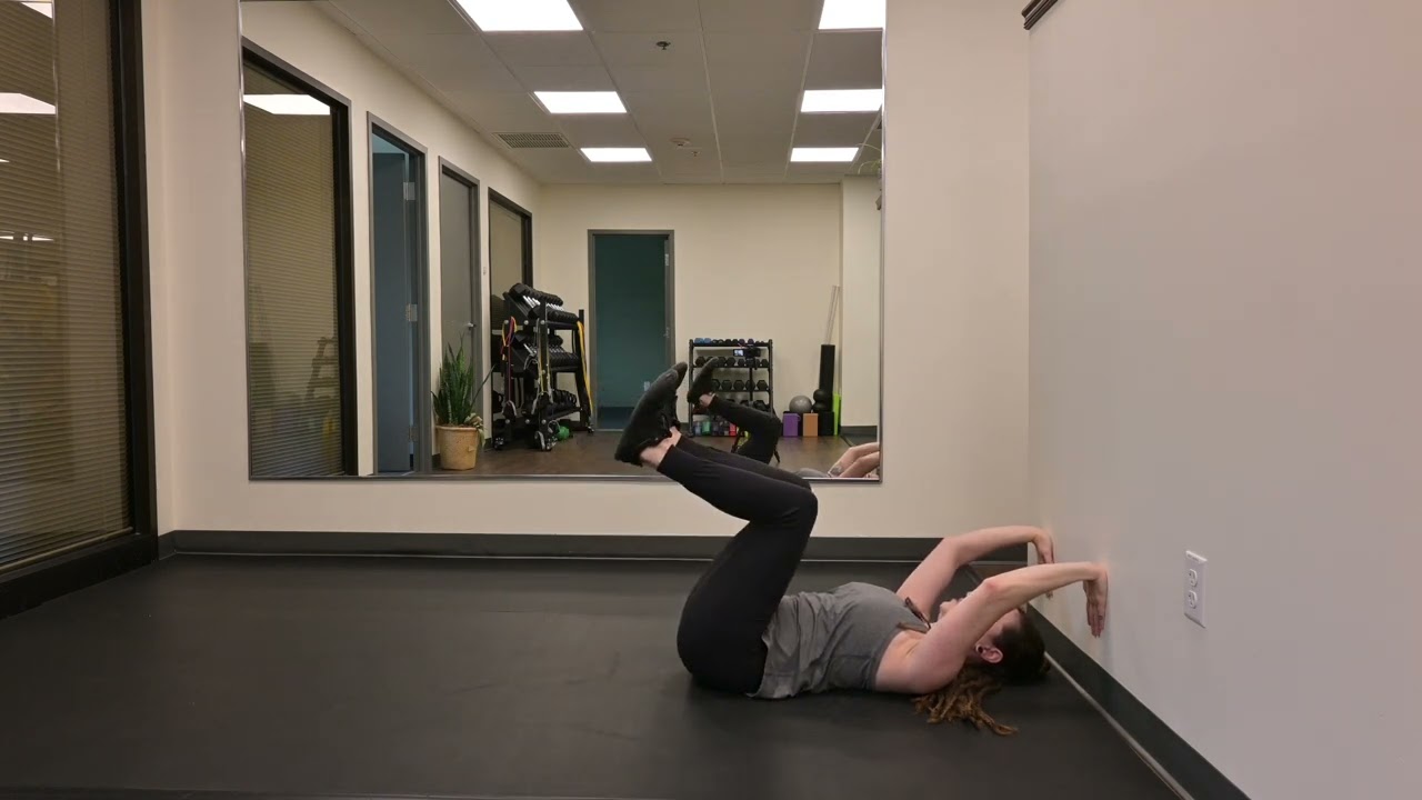 Week 97: Wall Referenced Dead Bug Heel Taps