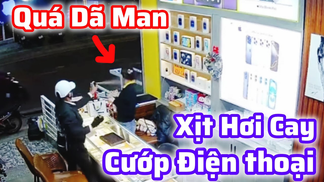 Quá dã man tên cướp xịt hơi cay vào mặt cô gái cướp điện thoại