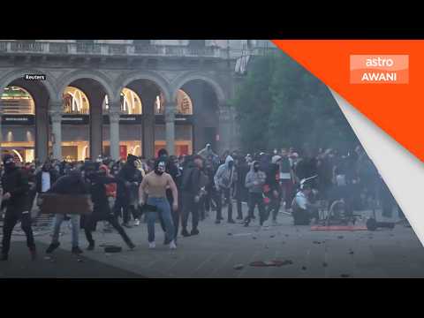 Protests in Milan turn violent, police clash with demonstrators