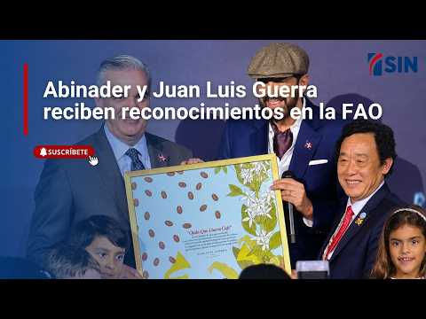 Abinader and Juan Luis Guerra receive awards at the FAO