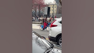 Man Rides Bike While Balancing a Fridge on His Head || ViralHog