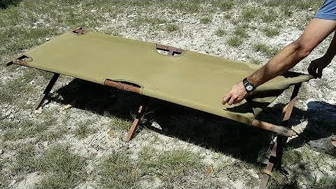 Army Cots: The Easy way to stretch the second end stick over the side rail pegs