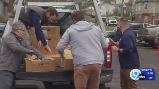 Crouse Hospital employees helping out at local food drive in Syracuse