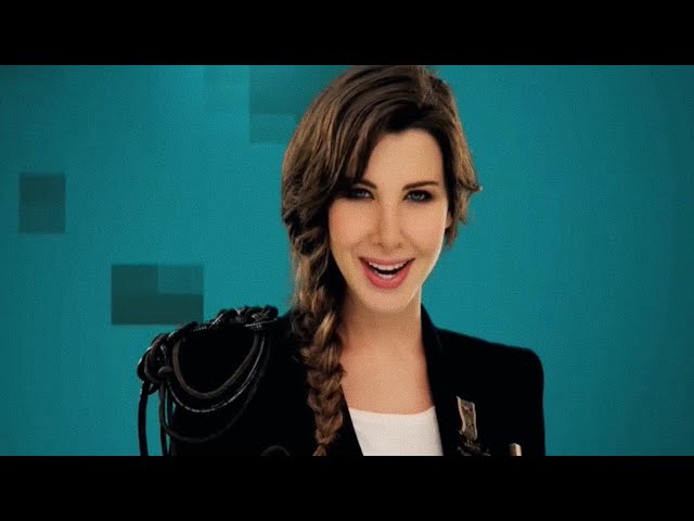 Nancy Ajram Feat K'naan - Waving Flag (Official Music Video)  / نانسي عجرم - شجع بعلمك class=