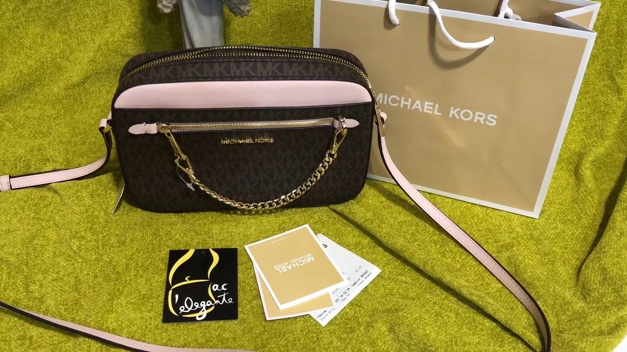 Arriba 62+ imagen michael kors jet set east west crossbody bag ...