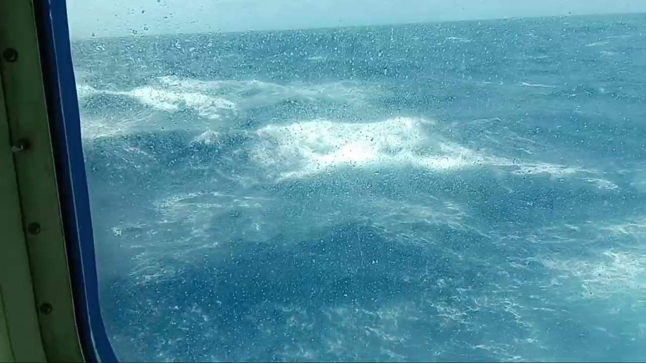 Ocean waves from window of Norwegian Gem cabin 5552.