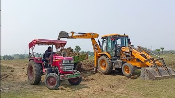 New Jcb 3dx Backhoe Loader Machine Loading Red Mud In Mahindra YUVO 575 DI Tractor | Jcb Video | Jcb