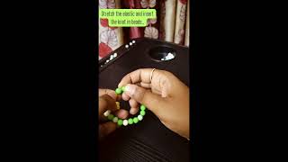 How to hide the knot on stretch bracelets ..  #bracelet #beads #handmade #shorts #business