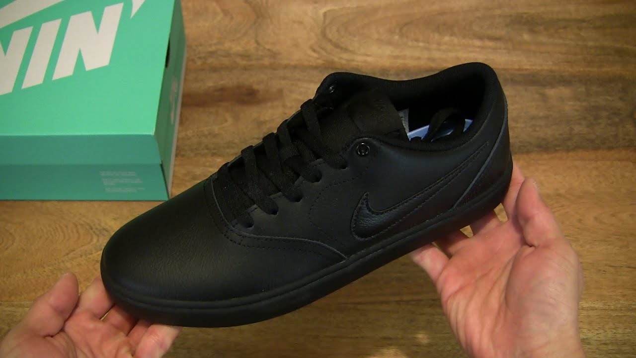 nike sb check solarsoft black leather