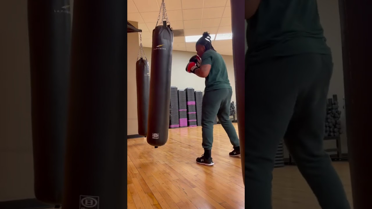 Boxer Beats Up Heavy Bag