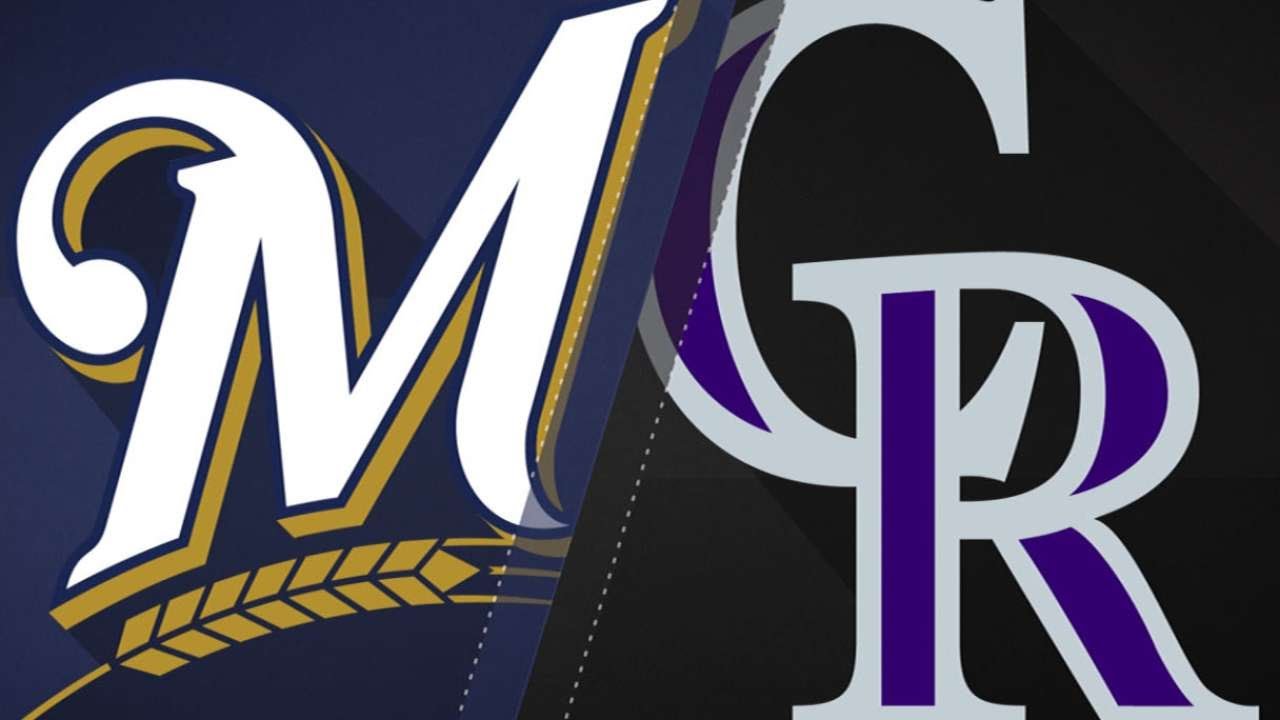 Peralta fans 13 in debut as Brewers beat Rockies 7-3