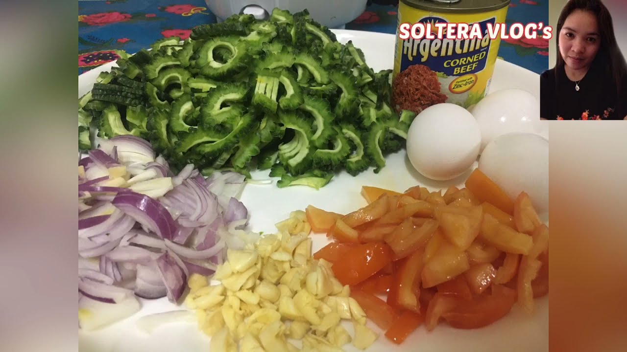 Ginisang Ampalaya with Corned Beef and Eggs Cooking food for Lunch