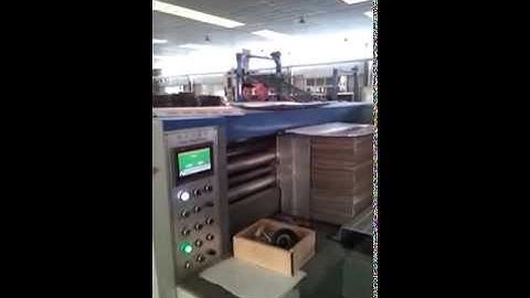 Automatic rotary die cutter with stripper and stacker