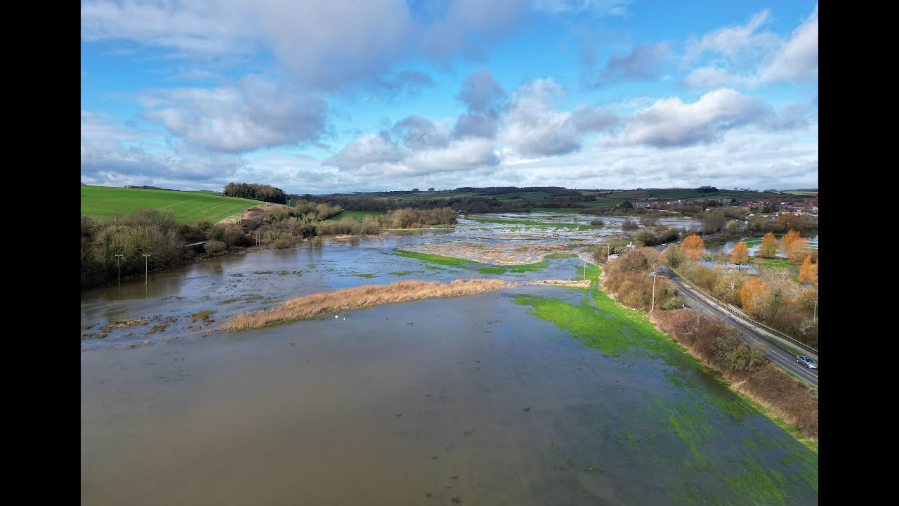 Rivers burst their banks in Dorchester as flooding hits the south of ...