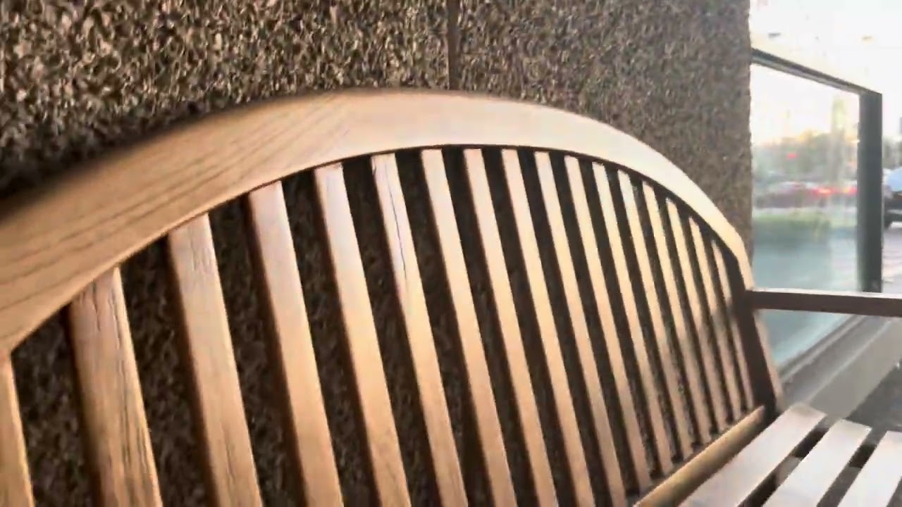 9981: A look at the wooden bench near Saks 5th Ave at South Coast Plaza with the beautiful sunset