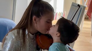 Karolina Protsenko got a beautiful kiss from her sweet brother