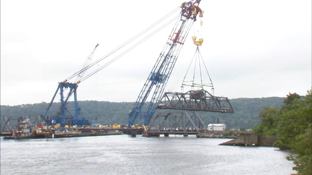 Restored Amtrak bridge moved into place - YouTube