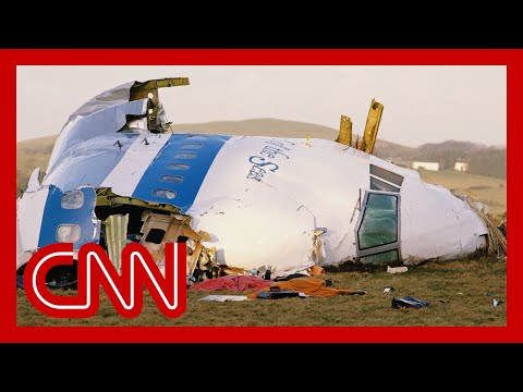 1988 footage shows Pan Am Flight 103 wreckage. The bombing suspect is now in US custody